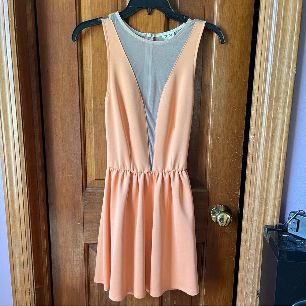 Tobi orange and sheer paneling